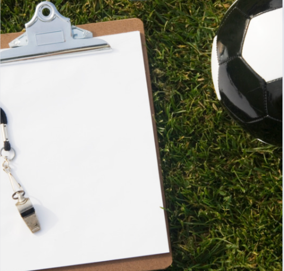 Clipboard and soccer ball