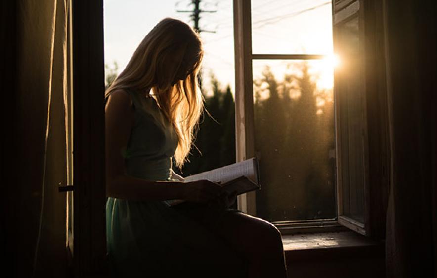 Girl Reading in Window