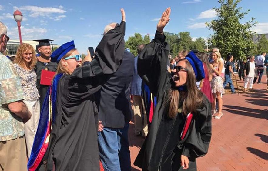 Students high fiving